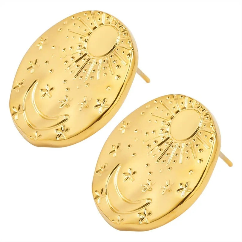 A pair of geometric shell design stud earrings in 304 stainless steel with gold or silver electroplated finish.
