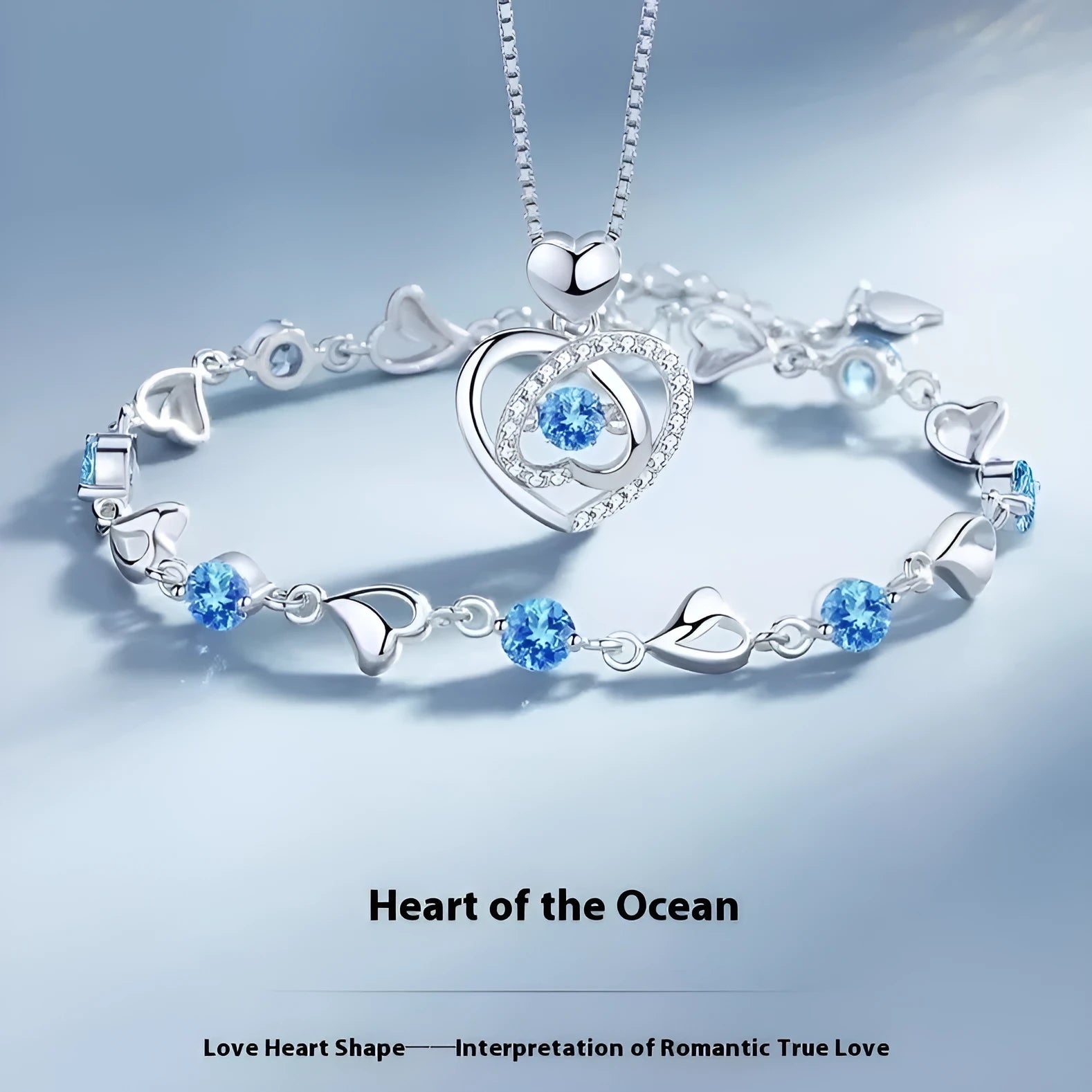 Blue diamond heart necklace and bracelet set with electroplated copper construction and gem inlaid pendant