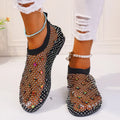 Women's colourful rhinestone mesh flat sandals on white background showing round toe design