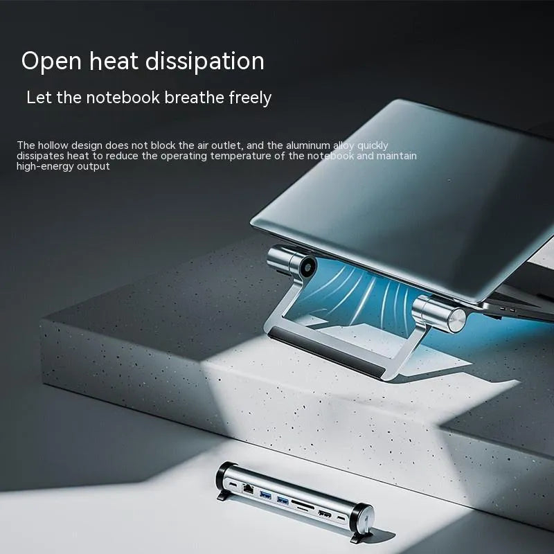 Aluminium alloy notebook docking station with multiple USB 3.0 ports and cable on desk