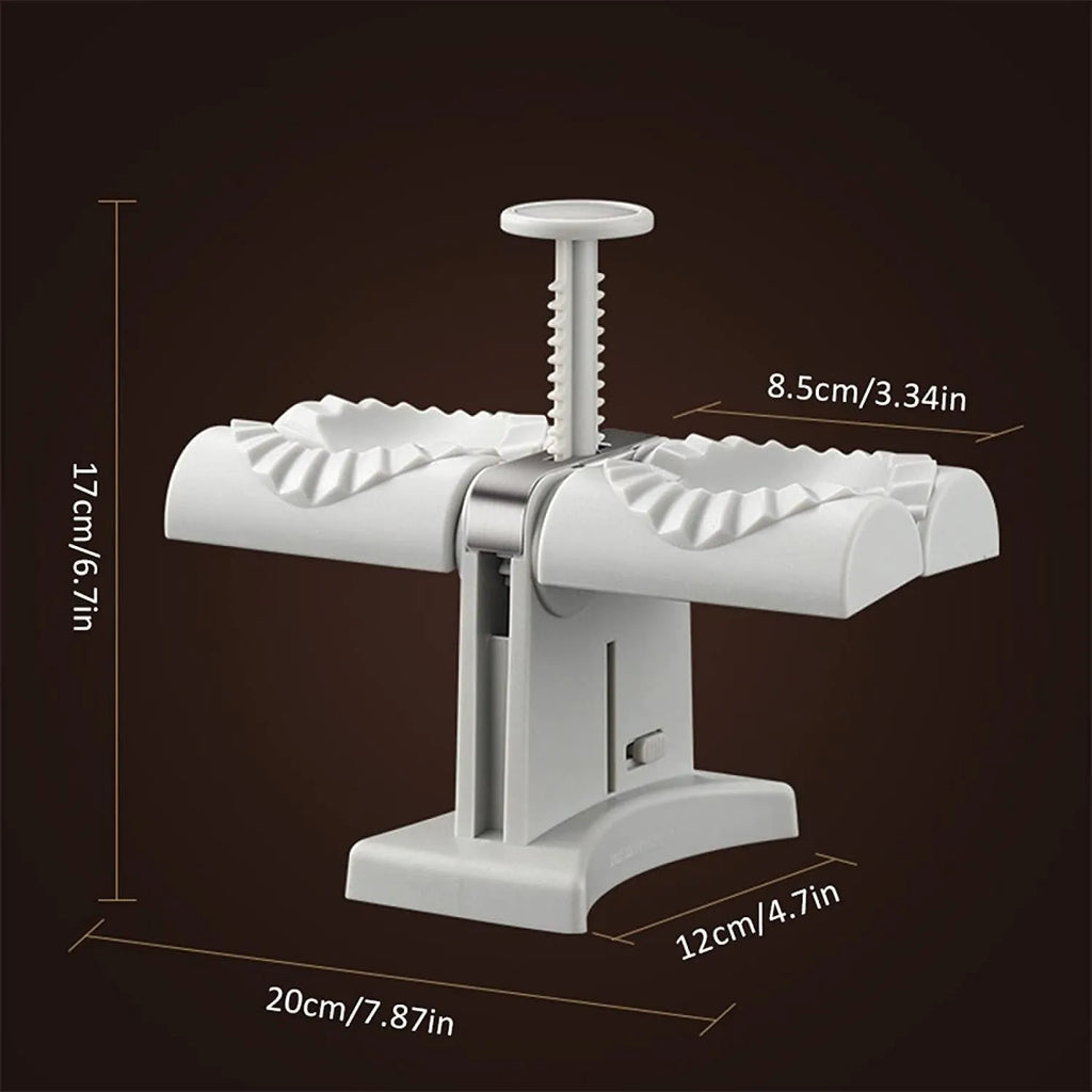White double head manual dumpling press mould with anti-slip rubber base on kitchen counter.