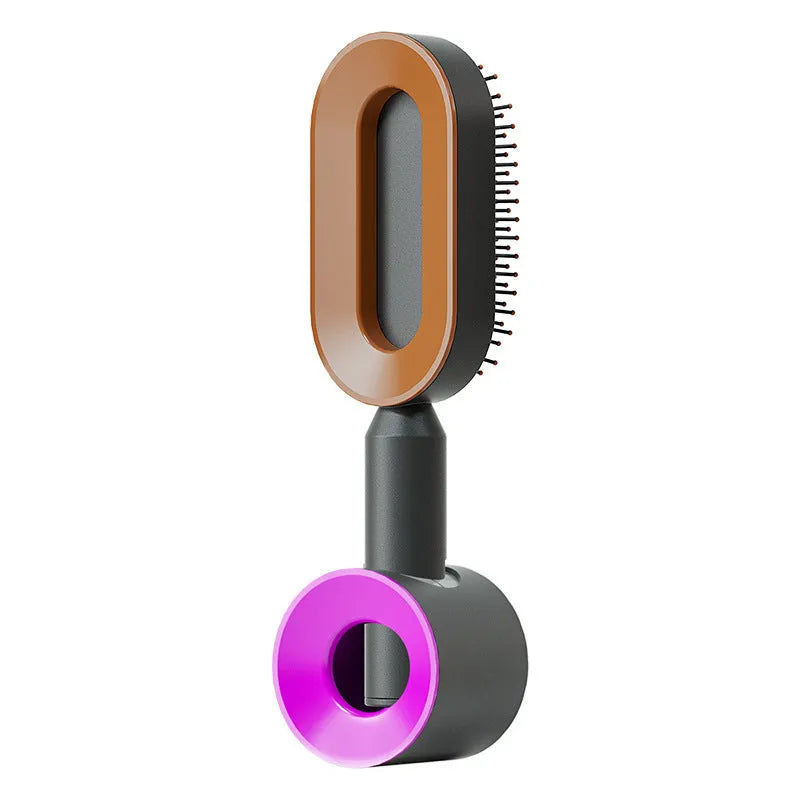 Self-cleaning air cushion hair brush in white, black gold, or black purple with ergonomic handle