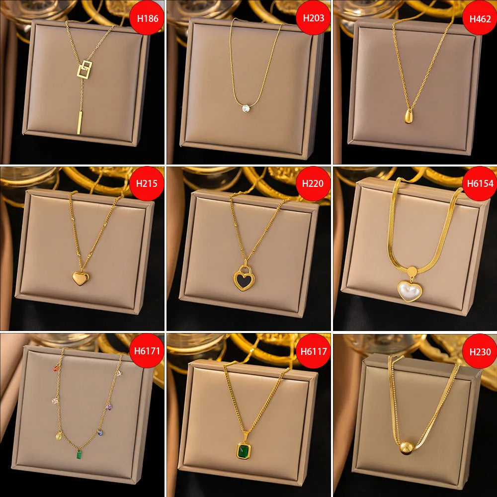 Gold titanium steel necklace with double ring pendant on a regular chain, listed as 37 H6012