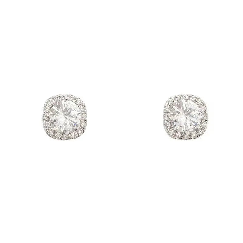 A pair of square-shaped geometric earrings with a diamond treatment detail, shown in a gold colour finish.