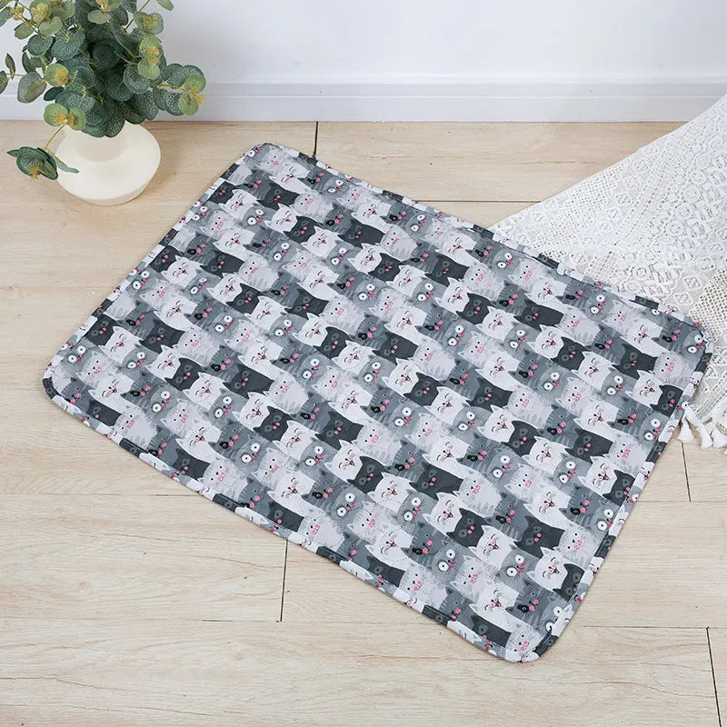 Reusable washable pet urine pad with colourful animal print and waterproof backing