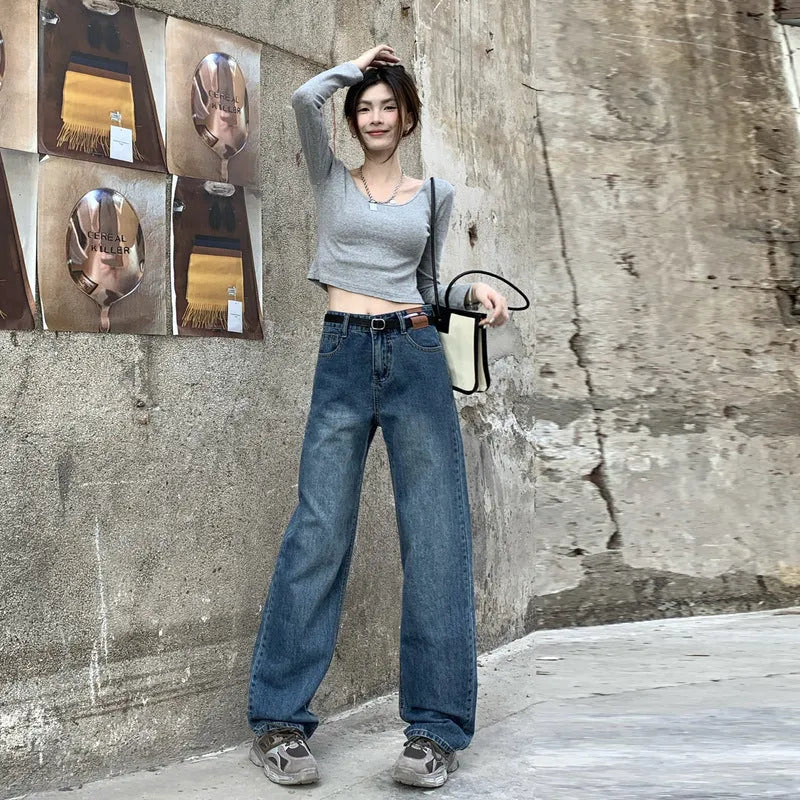 Women's Retro Blue high-waist straight-leg cotton denim jeans on a hanger.