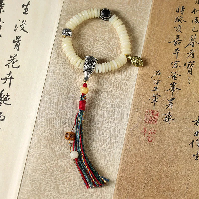 Tibetan white Bodhi bracelet with 3mm x 10mm beads in bracelet and handheld styles