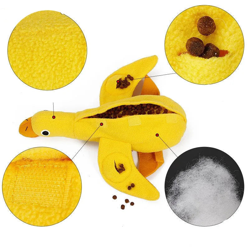 Yellow teddy duck dog toy with food leak openings for treat dispensing during training and play