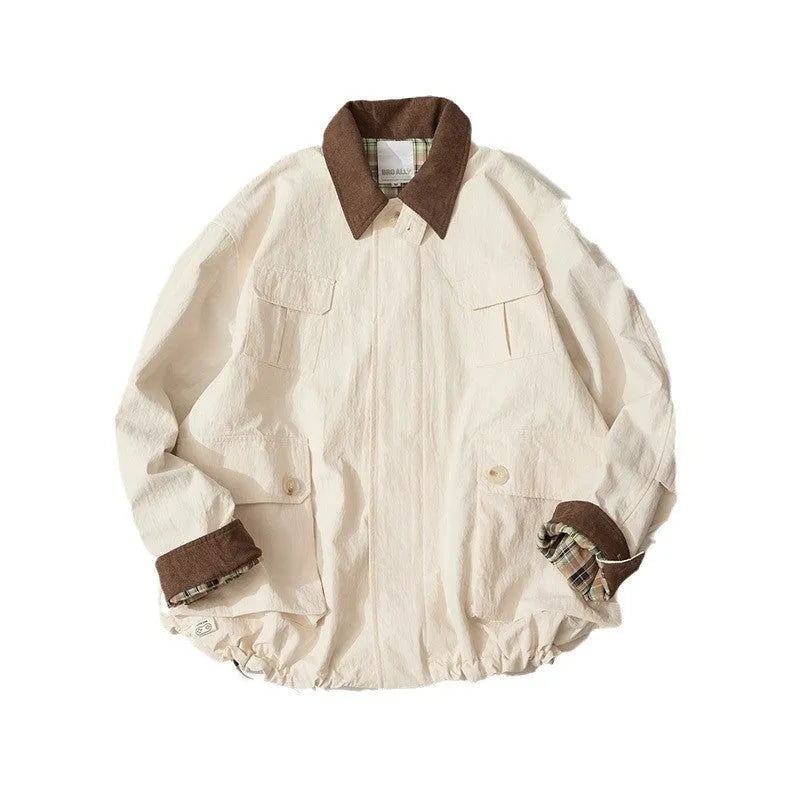 Green casual jacket with side seam pockets on a hanger, showing regular fit and long sleeves.