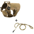 Outdoor tactical polyester dog vest in black with matching leash, set on grass