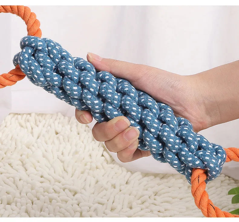 Blue double-ring braided cotton bone dog chew toy for teeth cleaning.