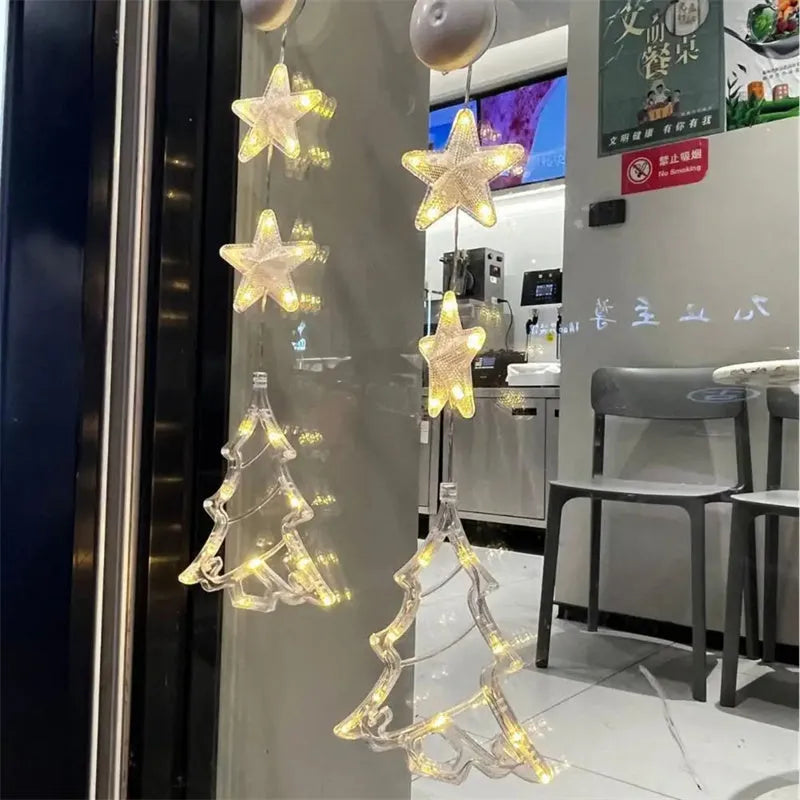 Christmas LED window decorations with suction cups showing star, tree, and deer pendant designs
