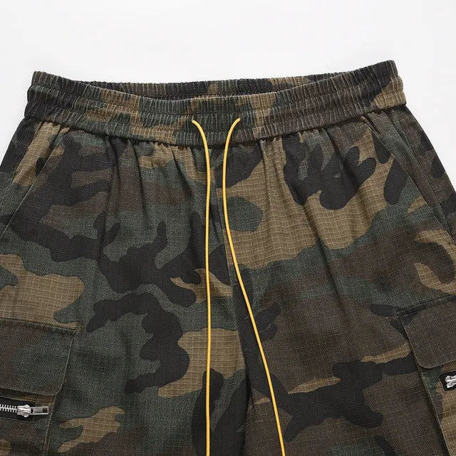 Men's green washed camouflage cotton shorts with a loose fit and mid waist design