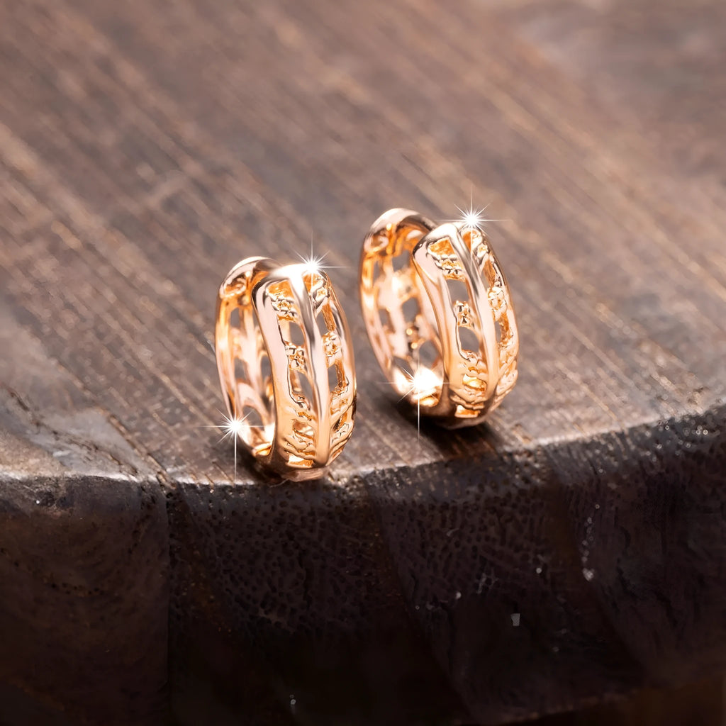 Rose gold hollowed-out copper earrings in heart and leaf shapes