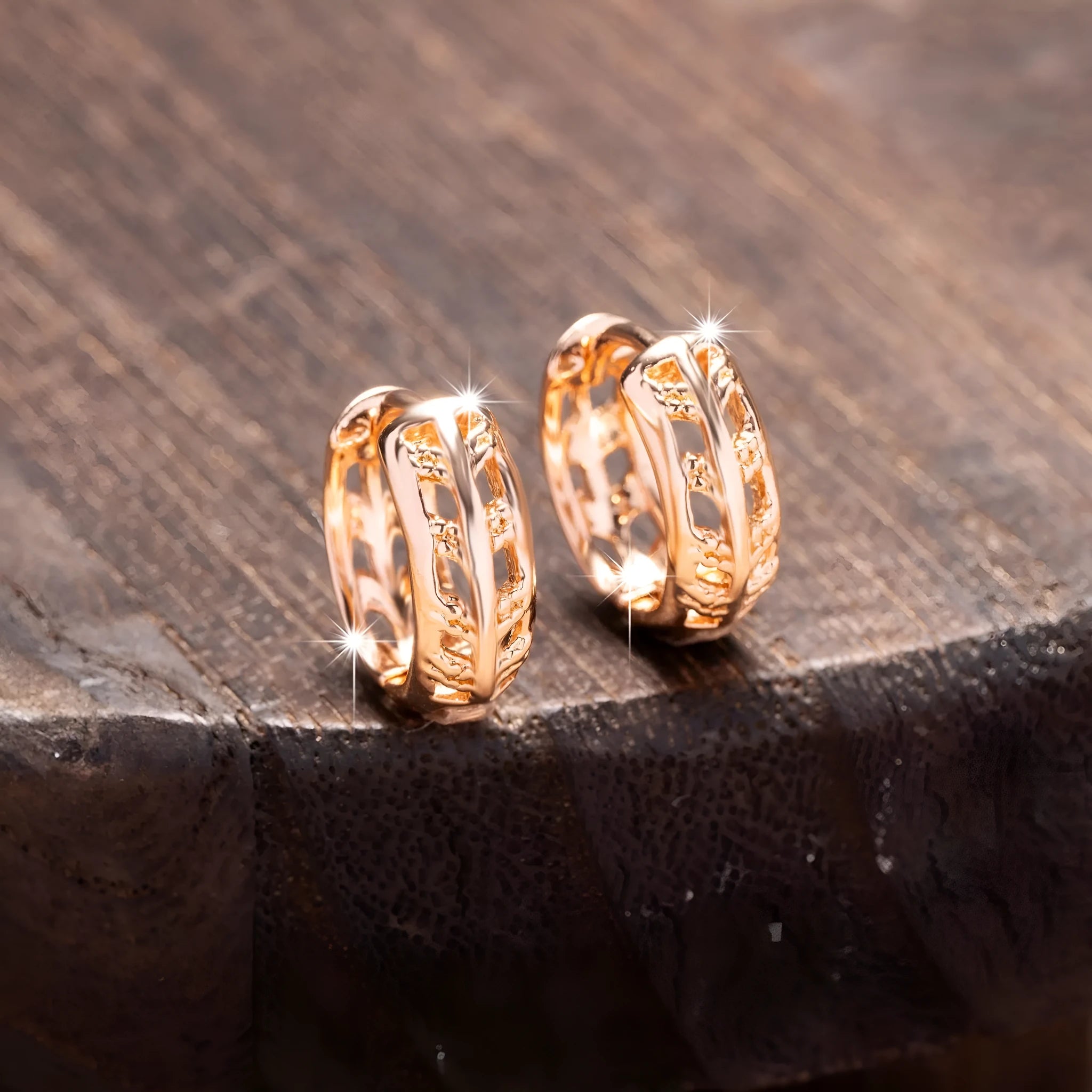 Rose gold hollowed-out copper earrings in heart and leaf shapes