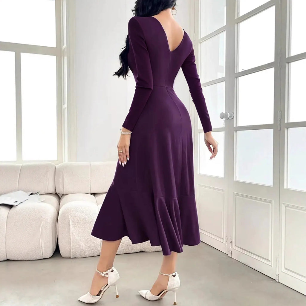 Purple women's long sleeve dress with ruffle detailing, round neck, and mid waist.