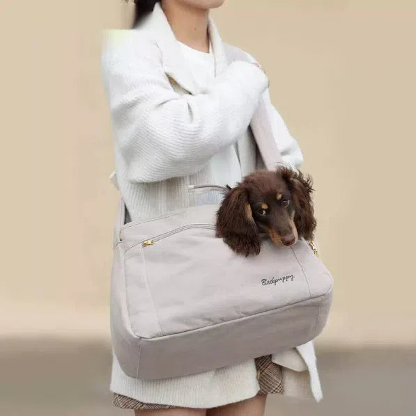 Off-white crossbody bag for small breed dogs with adjustable strap pet carrier sling