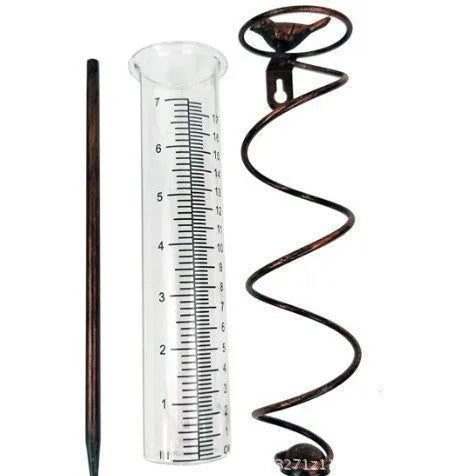 Cast iron garden rain gauge with hummingbird design and glass measurement tube showing 0-800ml capacity