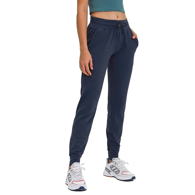 Women's high waist yoga pants with drawstring in cotton blend fabric for fitness activities