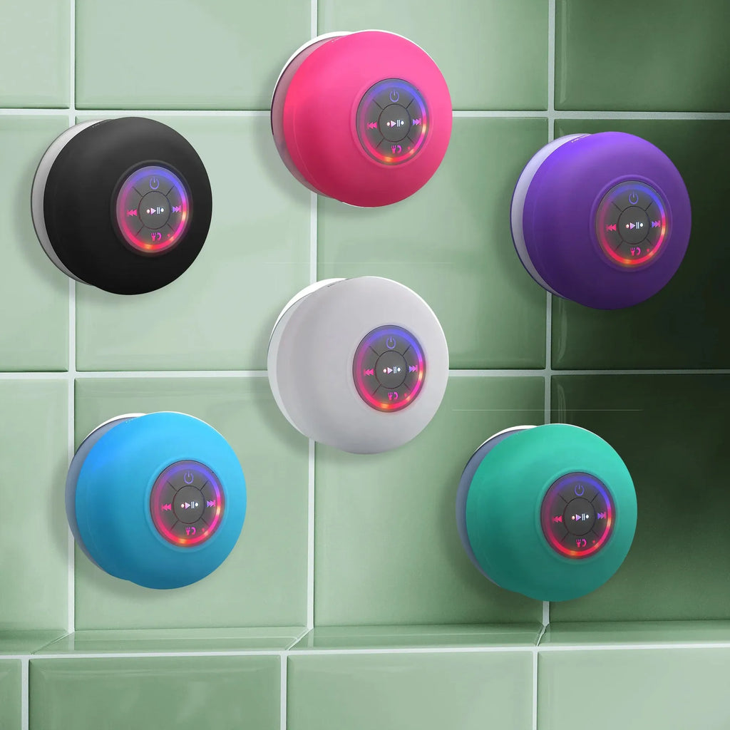 Waterproof Bluetooth speaker with large suction cup base and LED light in six colour options