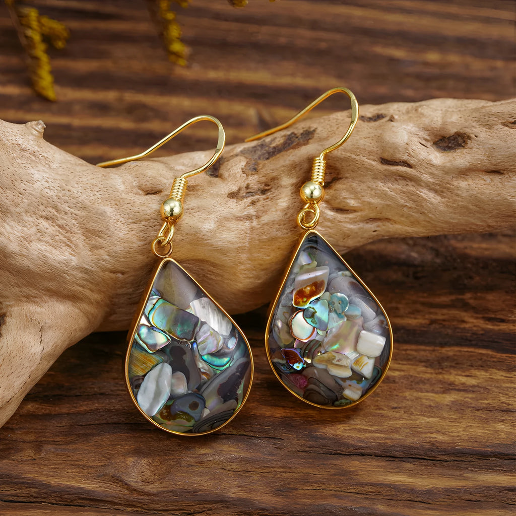 French retro teardrop abalone and shellfish earrings in gold 18K plating on white background