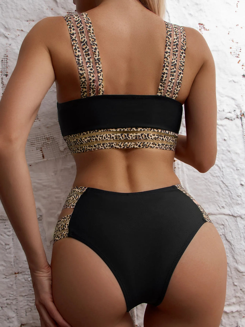 Women's black bikini set with leopard ribbon, underwire support, chest pads, and matching shorts, sizes S-L