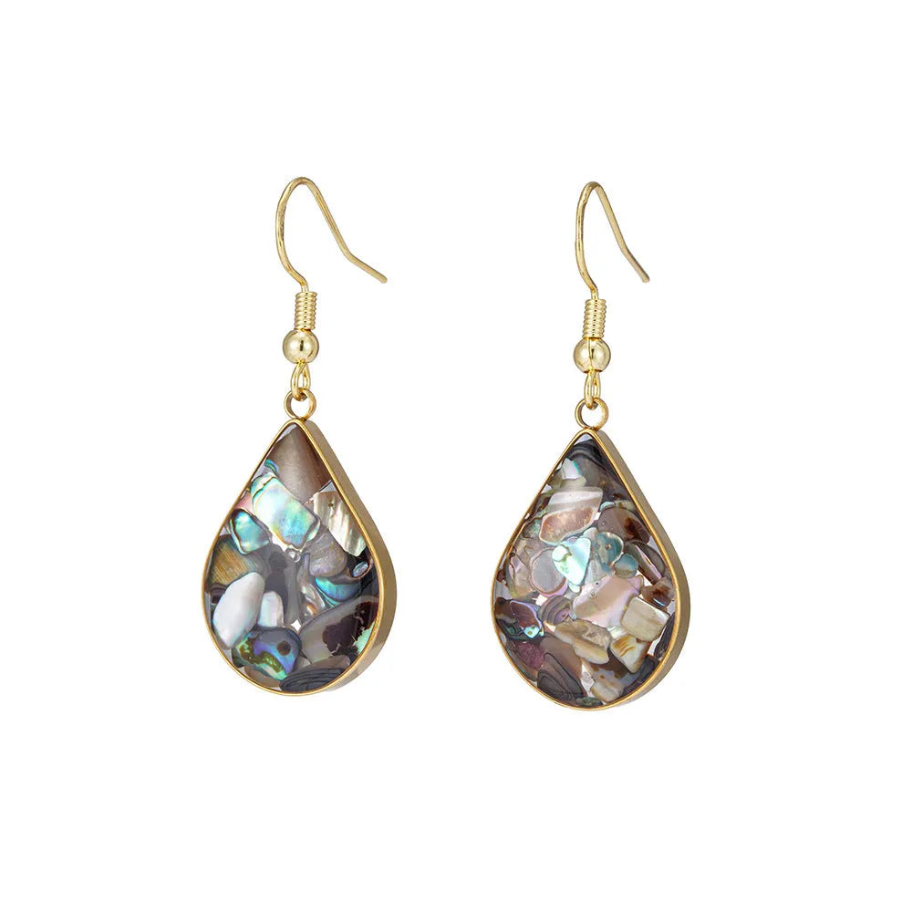 French retro teardrop abalone and shellfish earrings in gold 18K plating on white background