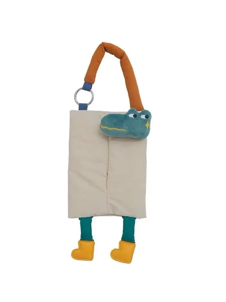 Hanging plush tissue buggy bag in baby crocodile design measuring 25x19cm