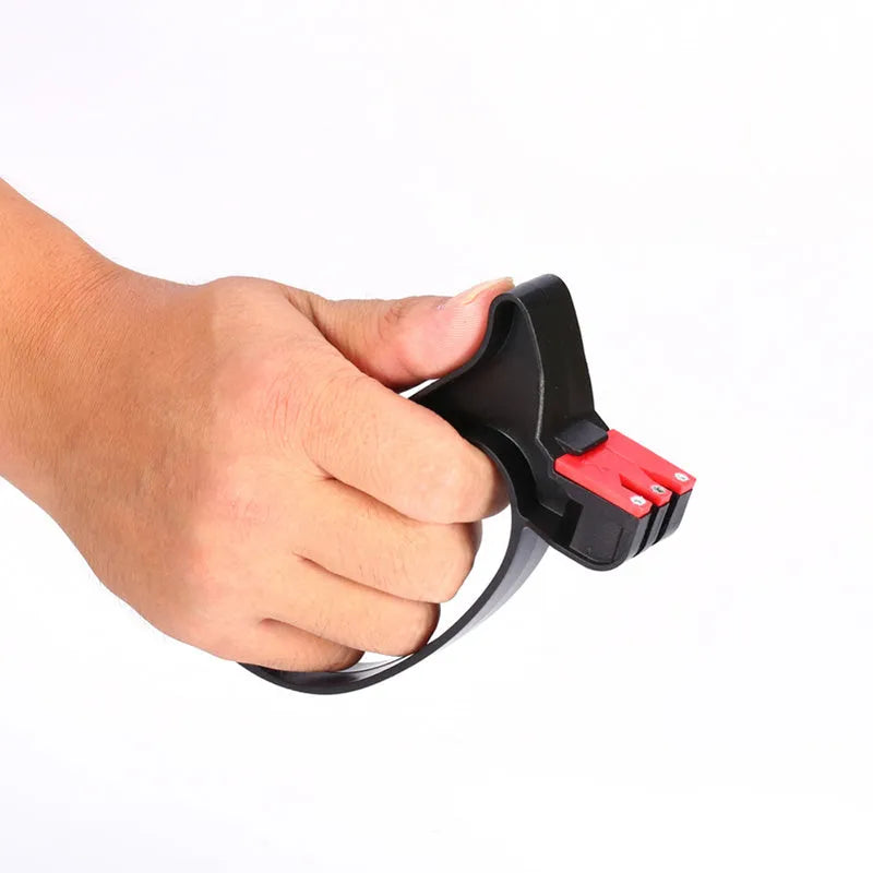 Black handheld knife and scissor sharpener with a tungsten steel blade