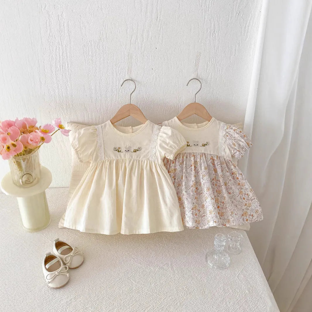 Girls' cotton lace summer dress with short sleeves and princess skirt in light apricot