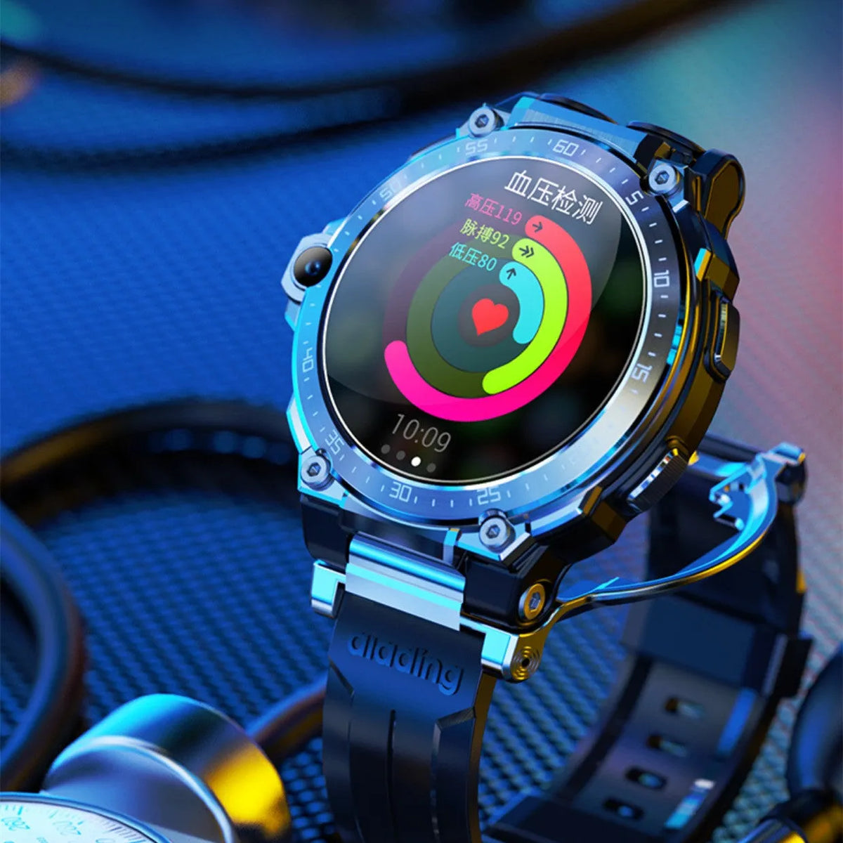Black smart watch with round 1.6 inch screen and silicone strap, showing heart rate and blood pressure monitoring functions.