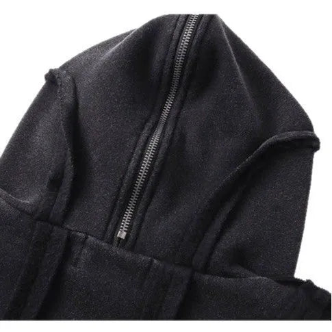 Black loose-fit men's hooded cardigan coat with a zip front on a model.