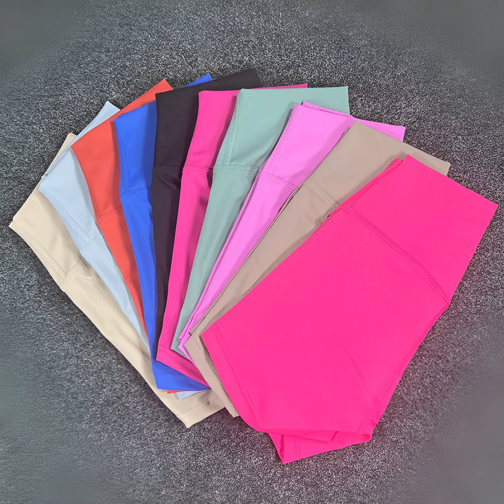 Women's high-waist nylon yoga shorts in pink litchi colour, shown for sports use.