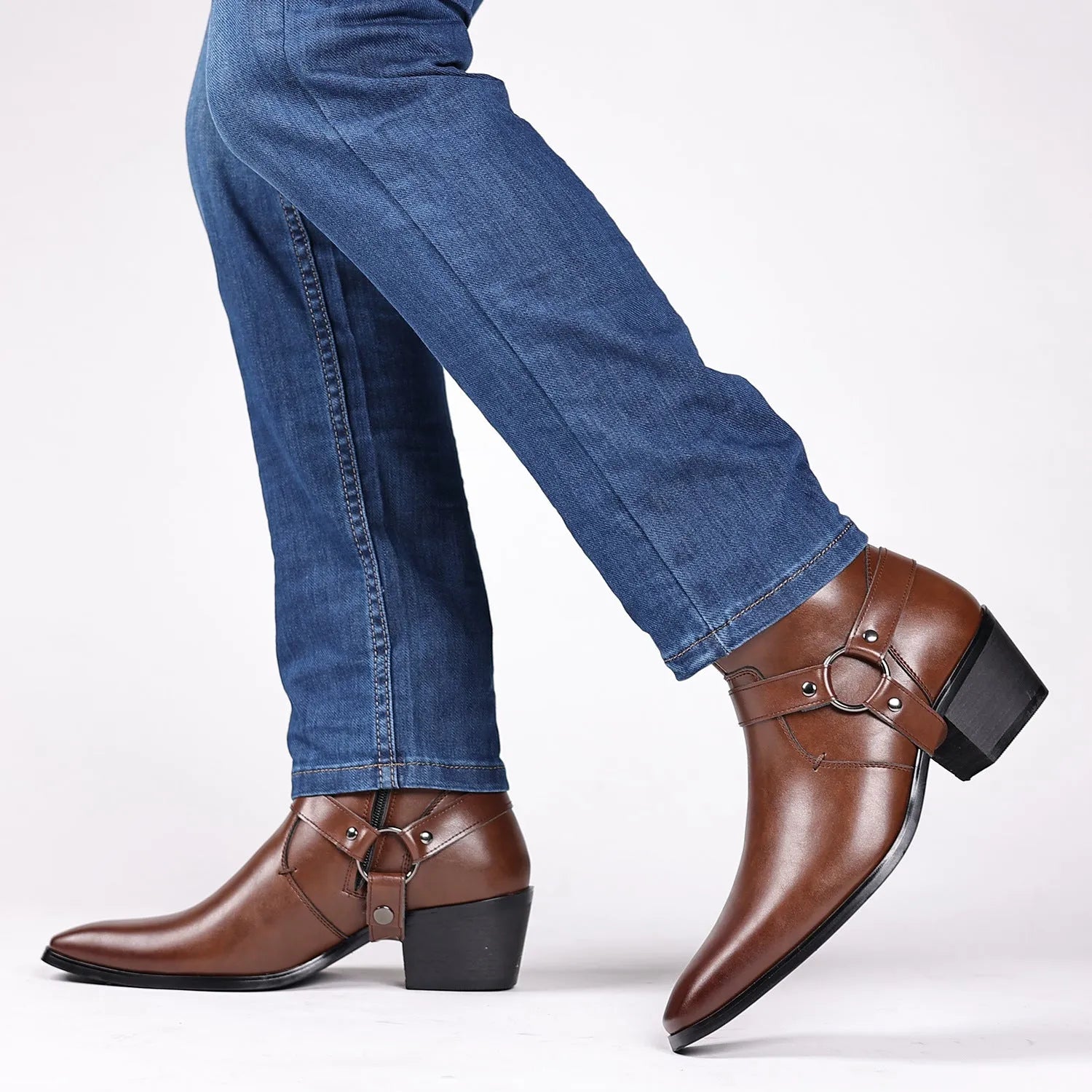 Black unisex ankle boot with side zip, square toe, and rivet details on a rubber sole.