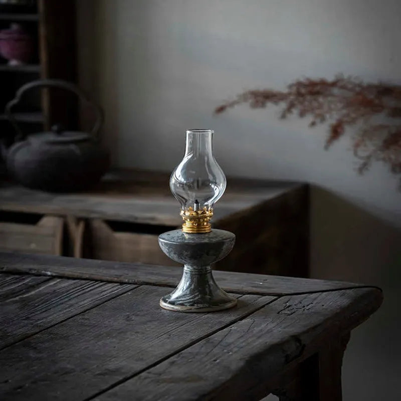 Handmade black Shino kerosene lamp ornament, 23.8cm high and 7.8cm wide, with underglaze finish and retro split design.