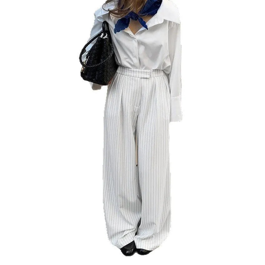White striped loose wide-leg trousers with front zipper closure for commuting and workwear
