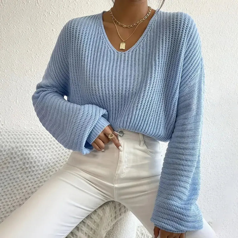 Women's solid colour long sleeve pullover top in a casual loose fit.