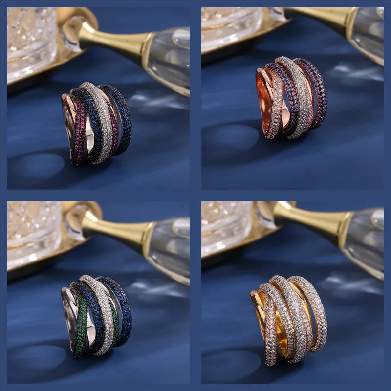 Women's geometric cross line ring with colour-separated zirconia stones in green, red, yellow, purple on a copper band