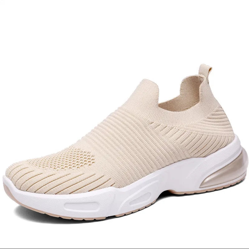 Slip-on breathable sock shoes in black, pink, khaki, and white with mesh lining and PVC sole.
