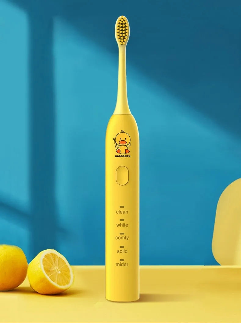 Yellow duck design USB rechargeable electric toothbrush with soft bristles and laser-engraved shell