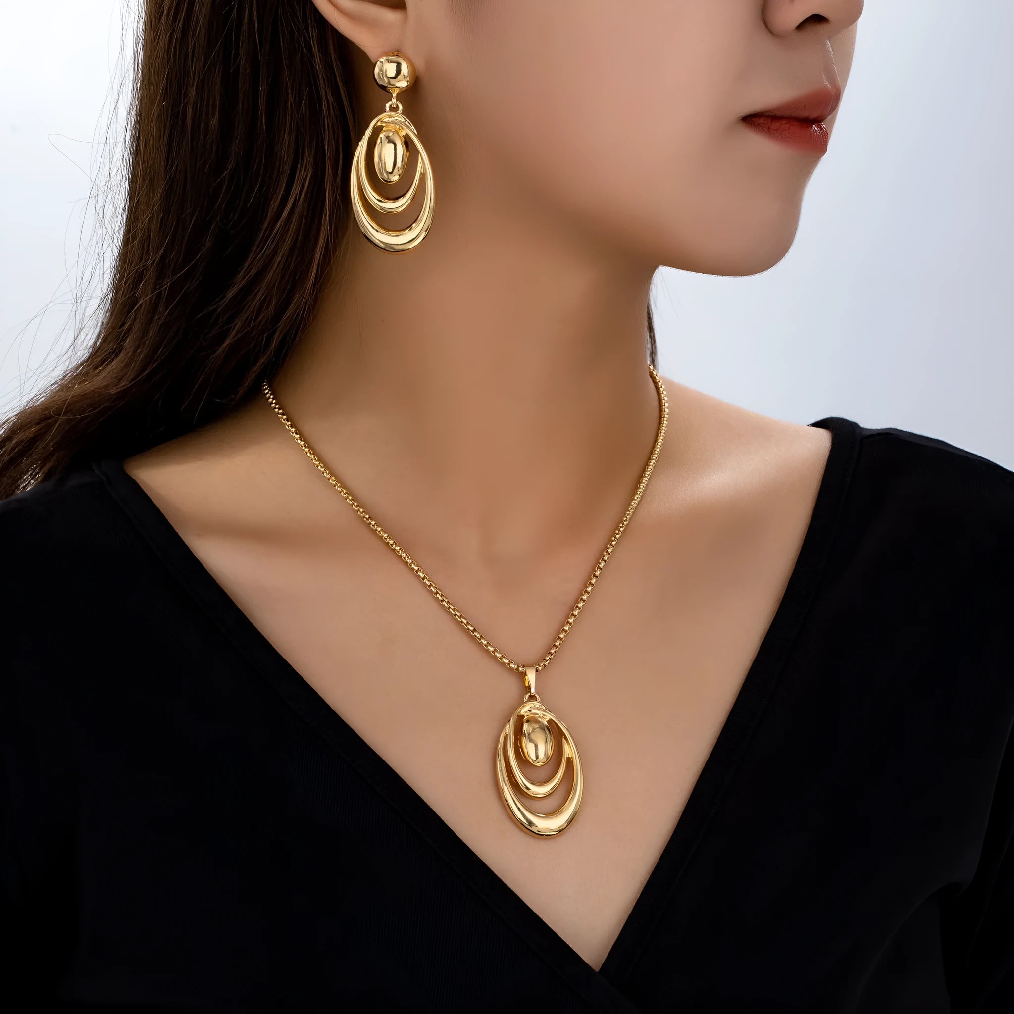 Fashion creative multi-ring drop shape earrings necklace three-piece set in golden alloy for women