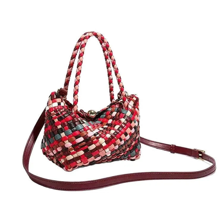 Colourful women's woven shoulder bag made from PU leather with braided texture.