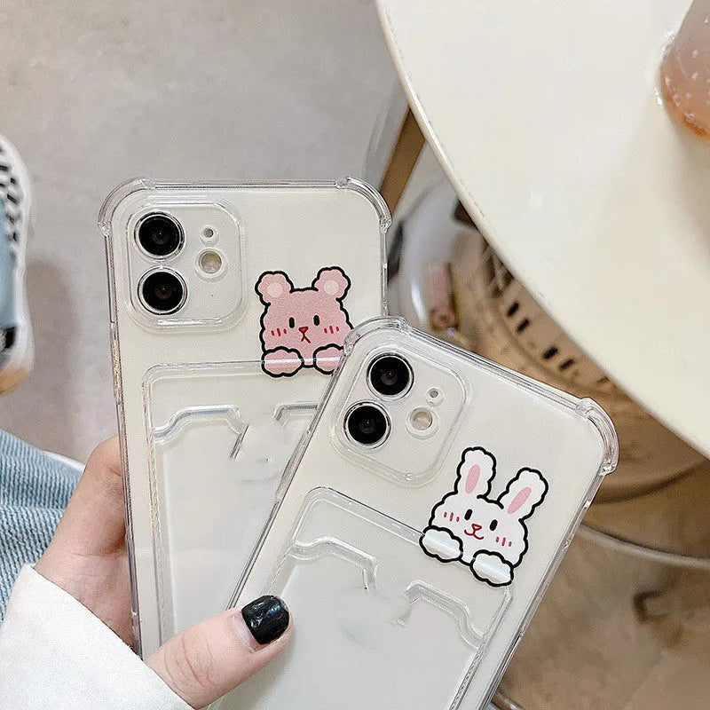 Transparent cartoon iPhone case with a built-in card holder slot.