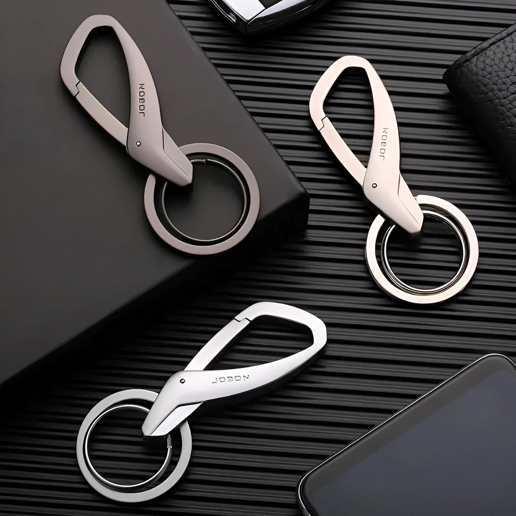 Simple metal double-ring key chain in black, chrome, or nickel finish on a waistband.