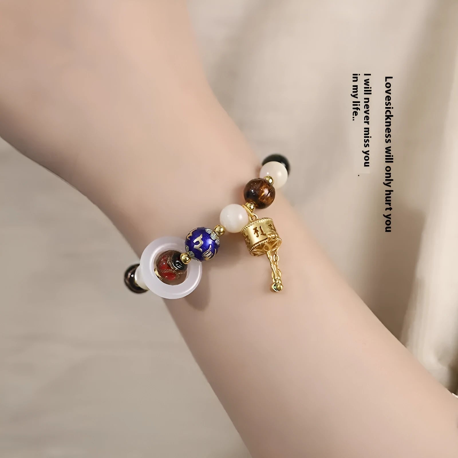 Hand-woven fragrant grey coloured glaze bracelet with sunstone, shell, and glass moon beads