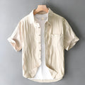 Men's pure cotton casual shirt in apricot colour with short sleeves and a loose fit.