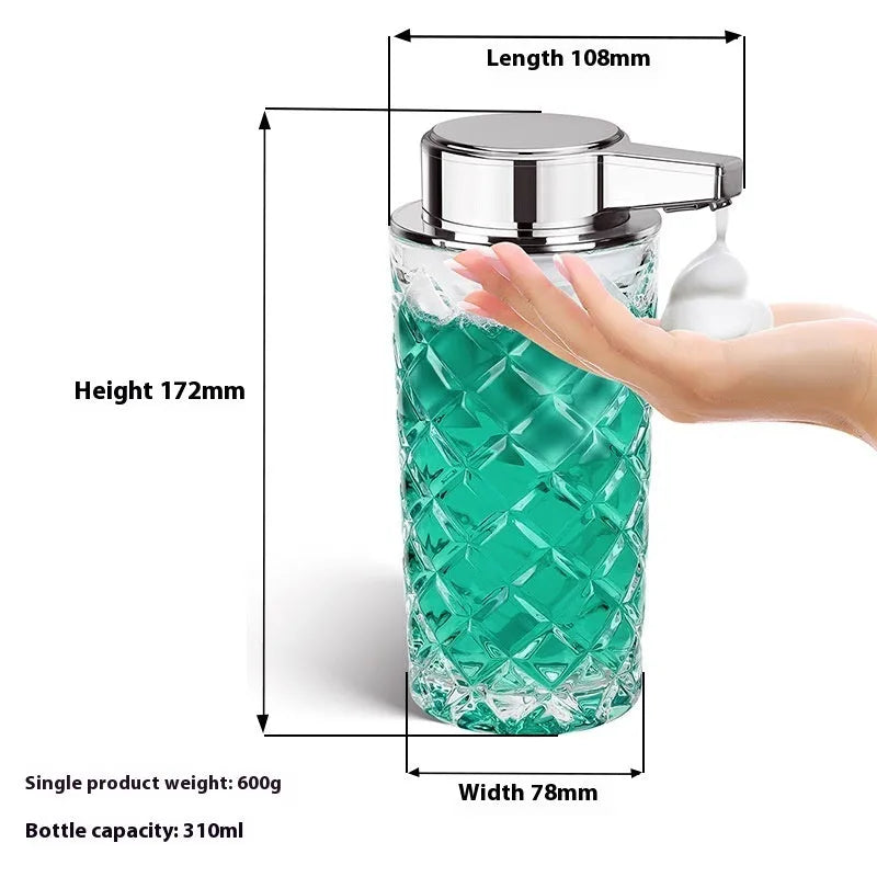 Silver automatic soap dispenser with sensor and USB-C charging port on a bathroom countertop