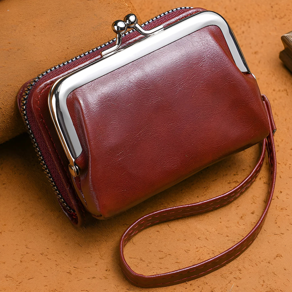 Ladies' black leather buckle coin purse with a 4-inch silver metal clip attached to a keyring.
