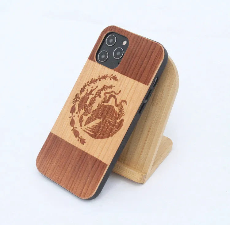Wooden mobile phone case with solid wood back panel and TPU bumper, showing elephant print design for iPhone