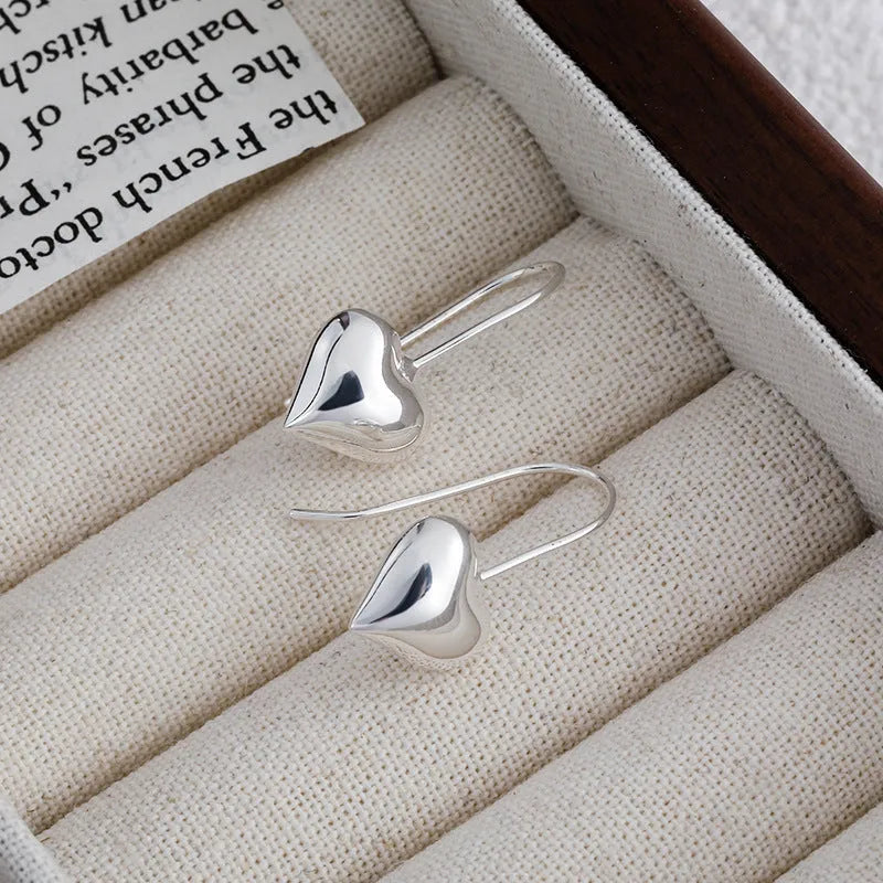 Korean style heart earrings with three-dimensional glossy finish and silver white gold plating